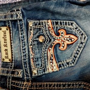 Iso rock revival jeans with orange/red stiching